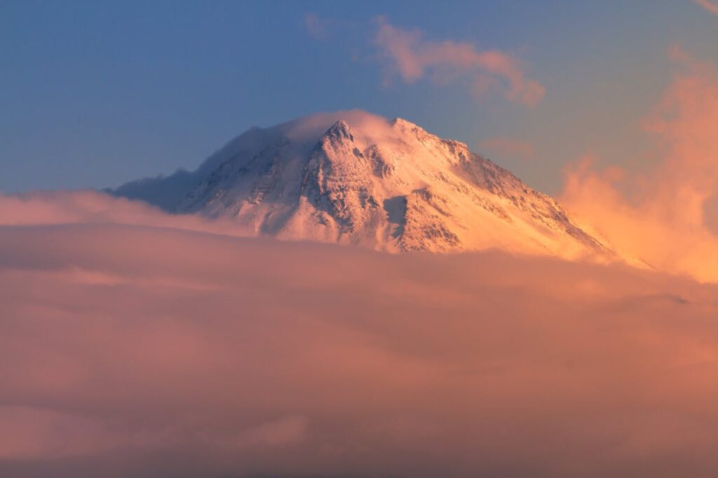 Capture the breathtaking sunset over Mount Hasan, Aksaray, Türkiye, adorned with pink clouds.